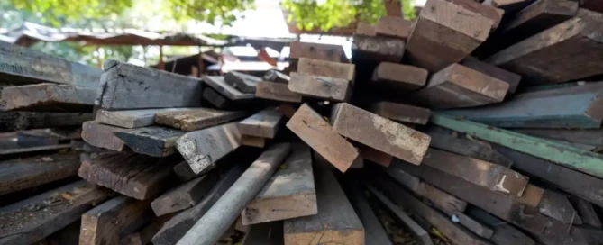 A pile of reclaimed wooded planks.